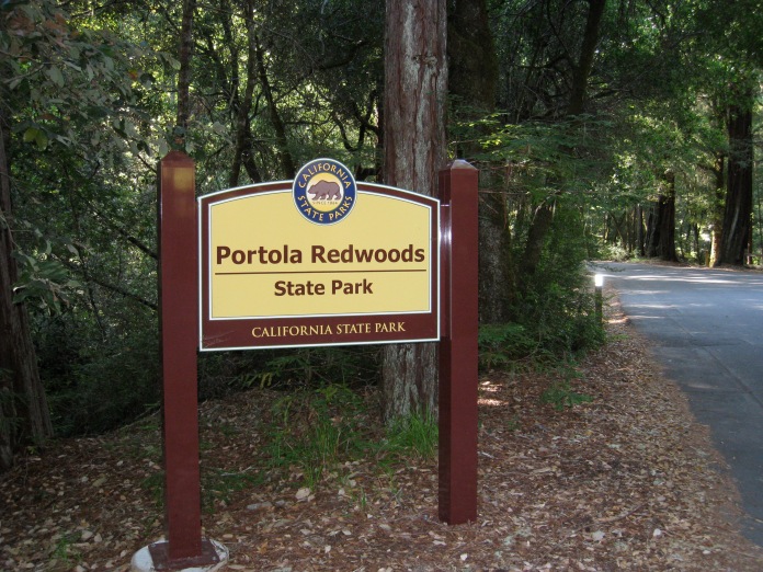 Entering Portola Redwoods State Park Headquarters. We expected this to be about 23 miles based on some approximate mapping. With no better measurements to go by, we defaulted to my watch, placing headquarters at 25.5 miles.
