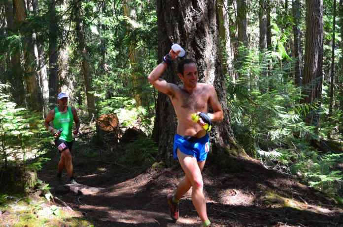 Using the last of my water to cool off, rolling into Buck Creek aid station, mile 27.2.